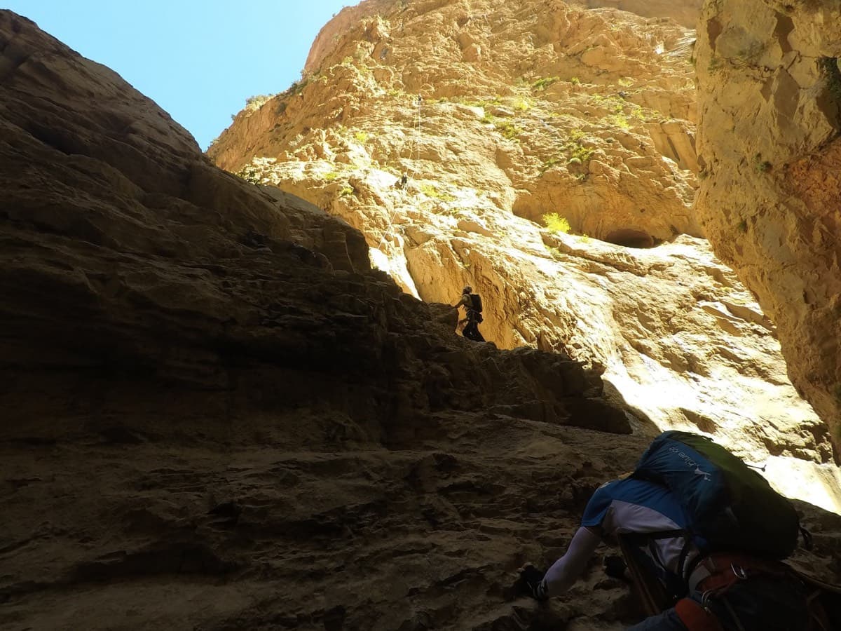 The last part of the approach: easy scrambling up rock steps out of the gully towards the west face.