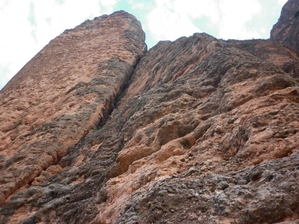 Looking up from the base: the Adamelo spur is the rib on the right (photographer's title).