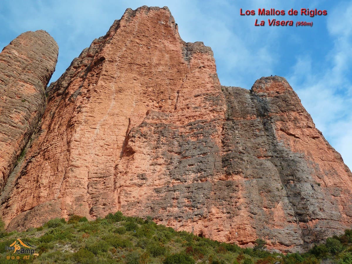 La Visera, labelled, seen from below: the big overhanging orange face that the route climbs.