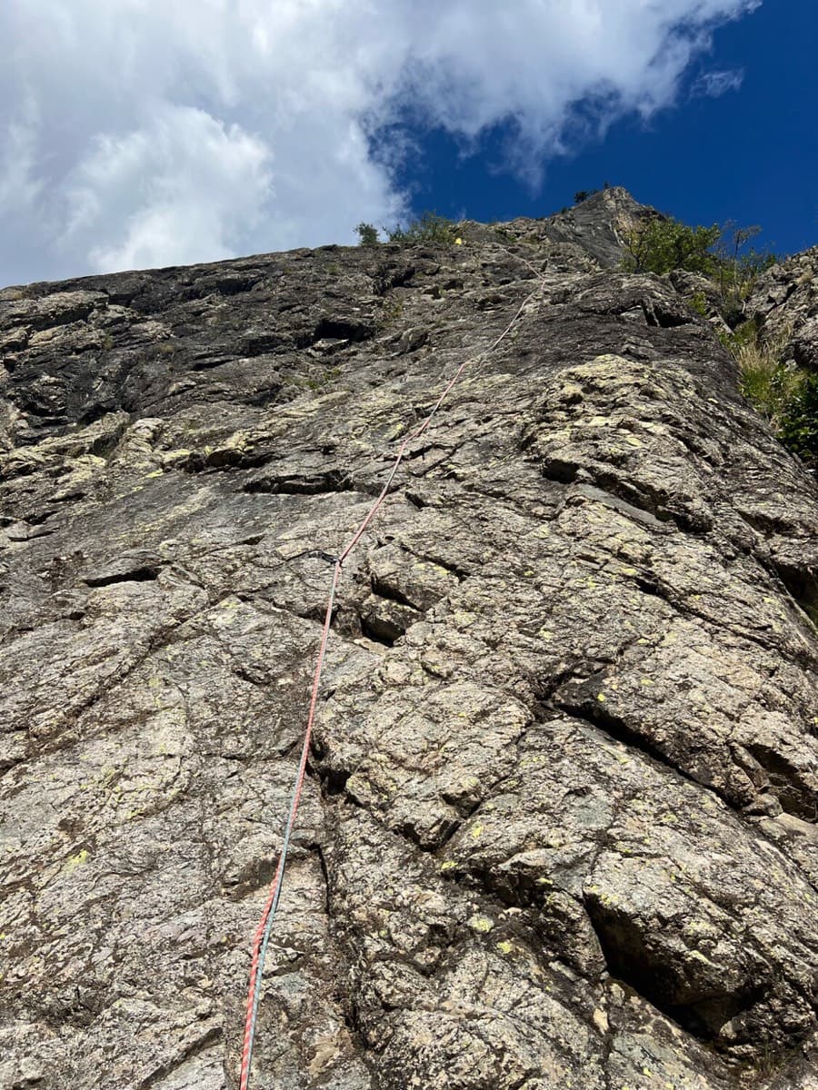 Looking up the first slab from the start of the route (2026 party).