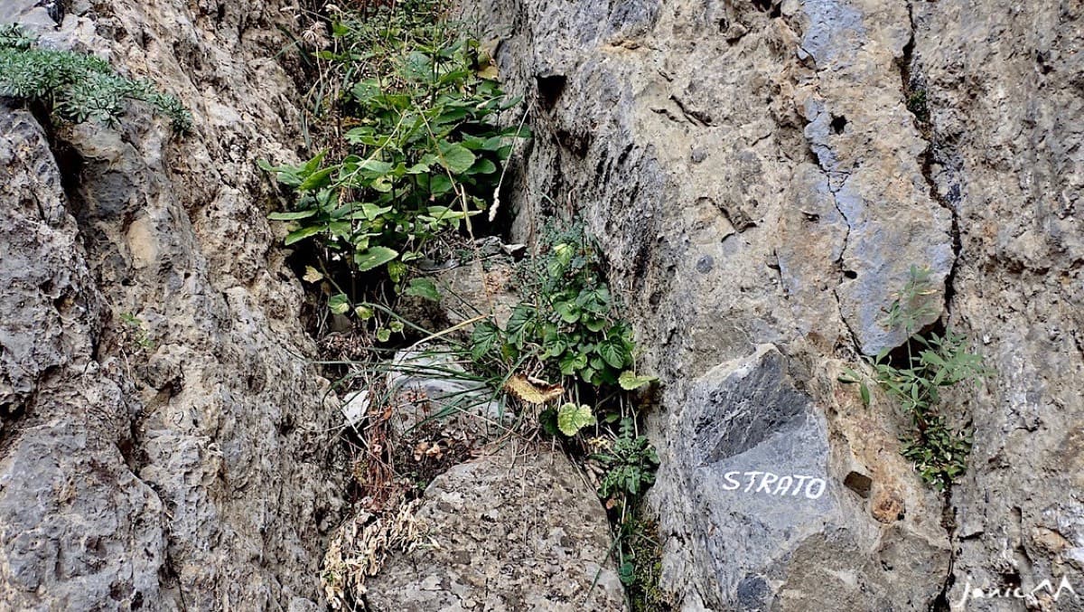 The start: 'STRATO' painted in white on a block at the foot of the chimney.