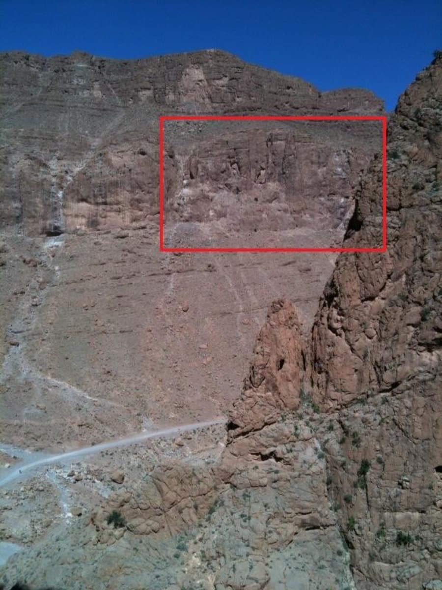 The Mur du Scorpion (boxed in red) seen from the opposite side of the valley: it sits above the scree slope that you climb from the road north of the gorge.