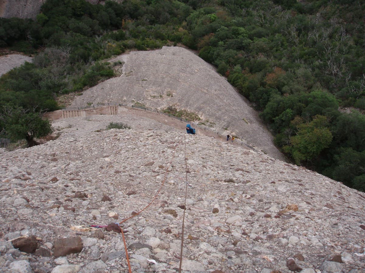 Looking down the first pitch: the route starts straight off the railed path, seen below.