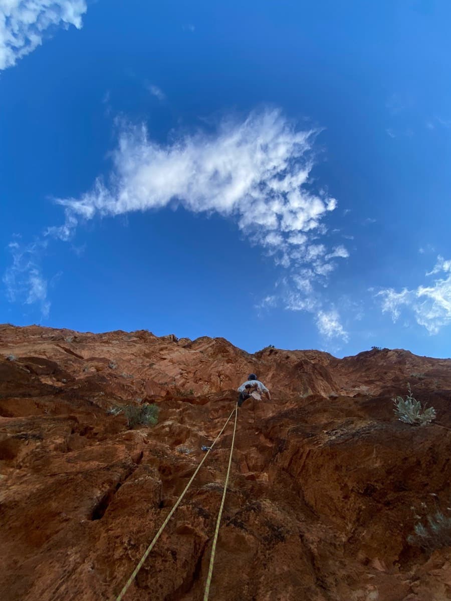 Looking up the red limestone of Kokkinovrachos during a May 2025 ascent of Mazi