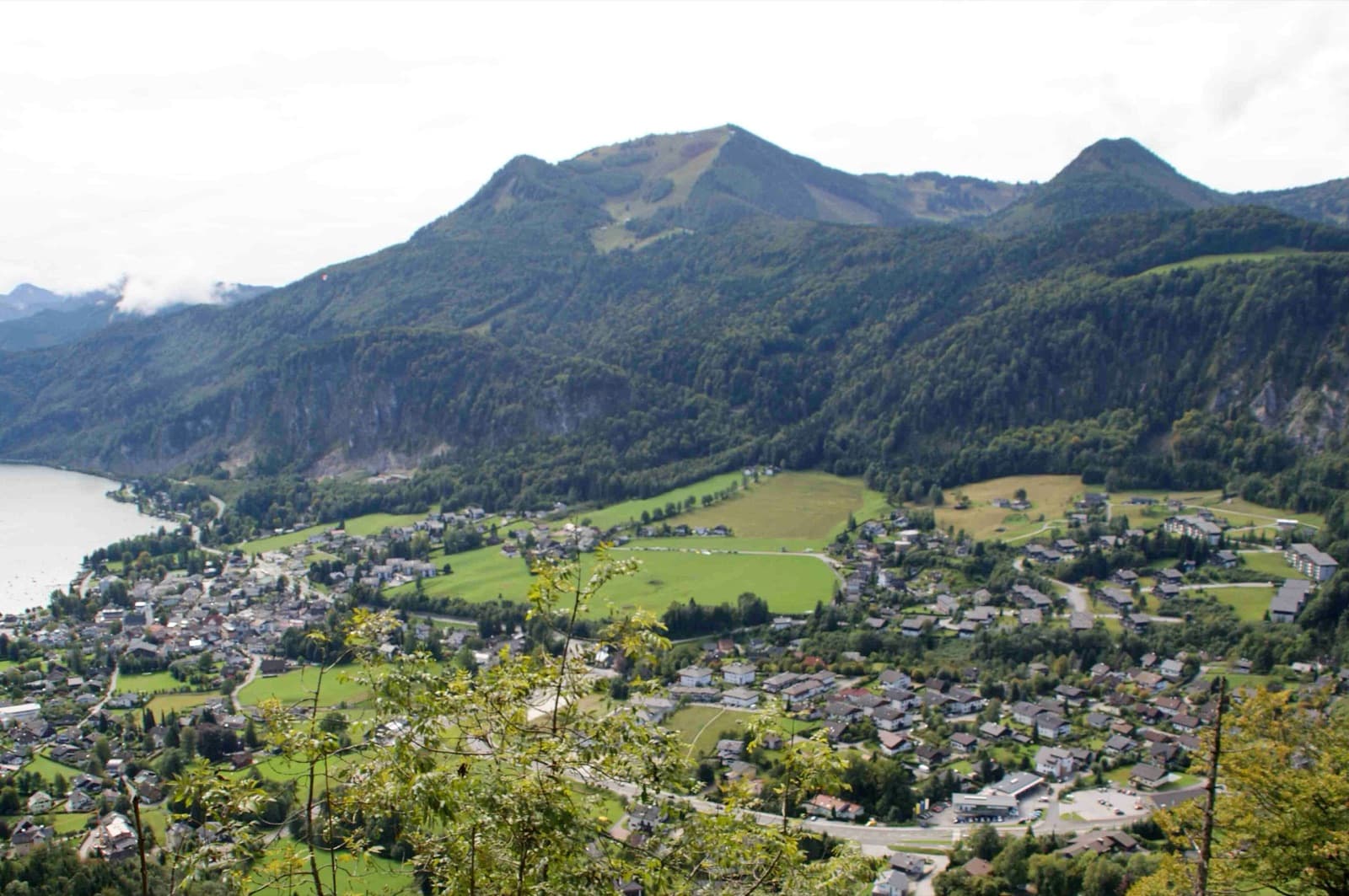 A view of the region, not this route's wall. St. Gilgen and the Wolfgangsee from the top of the Plombergstein.