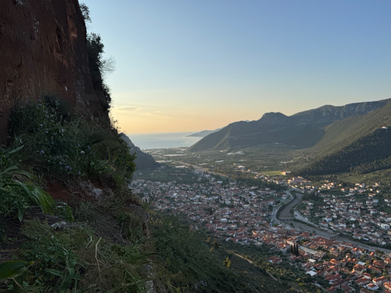 Leonidio and the Myrtoan Sea at dusk from the third belay of the route.