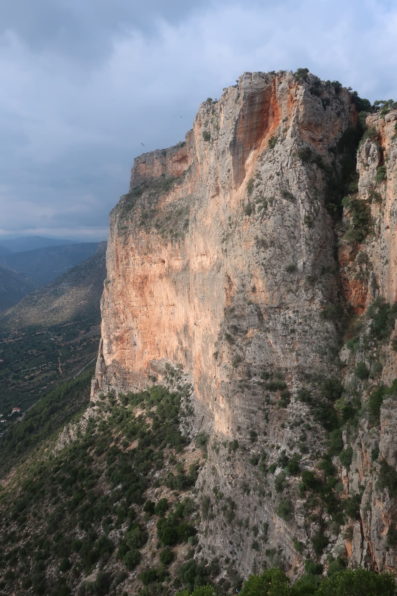 The orange pillar at the right end of the main Kokkinovrachos wall, Leonidio.