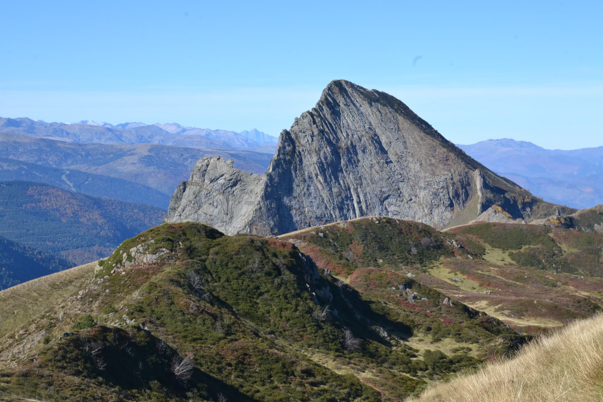 The east face of the Dent d'Orlu, a sweep of striated gneiss slabs, seen from the Col de l'Egue; Pink Floyd climbs this face, the exact line is not marked.