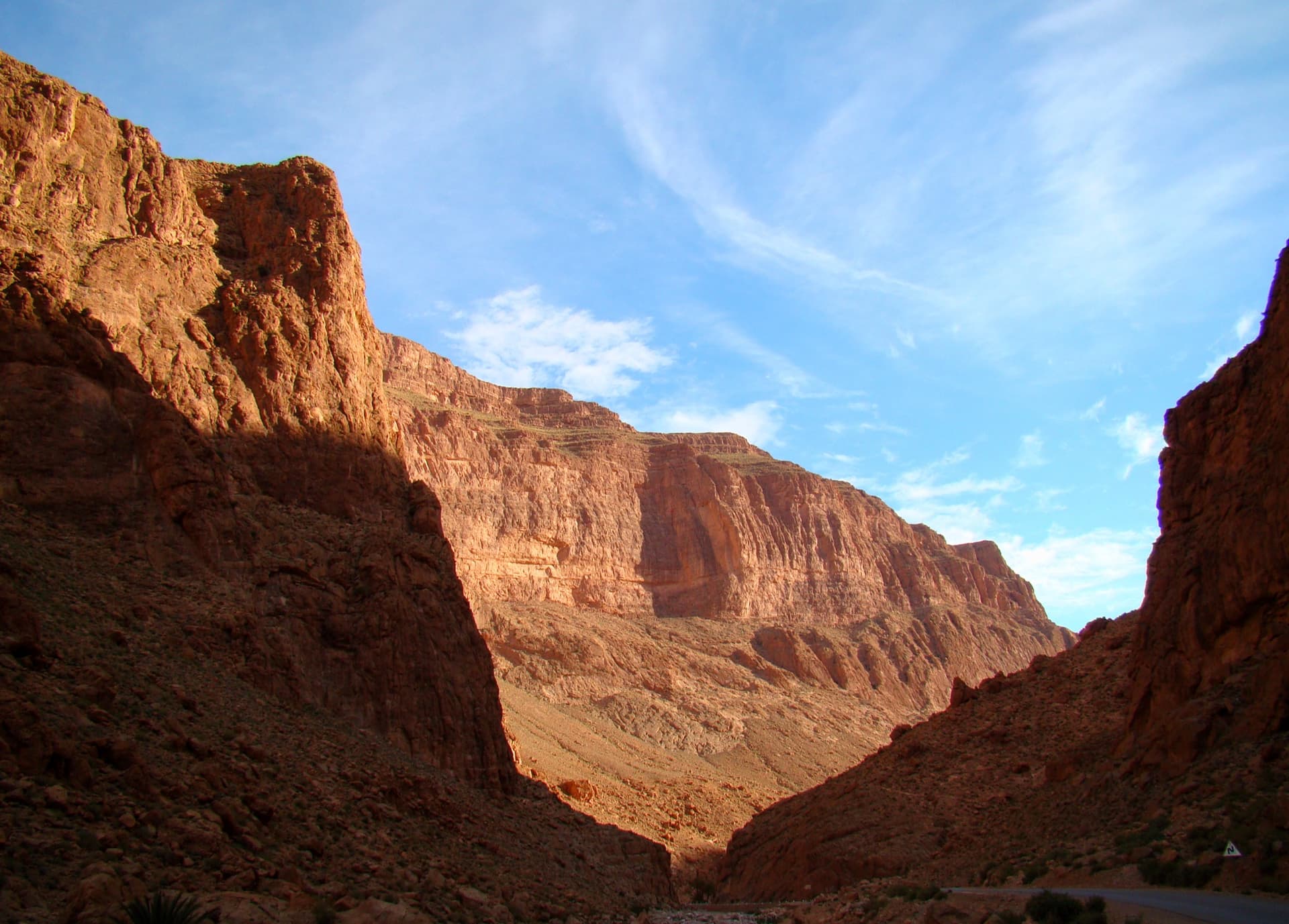The Todra Gorge looking upstream from above the narrows in morning light. The Paroi du Levant is further up the valley and is not identifiable in this view.