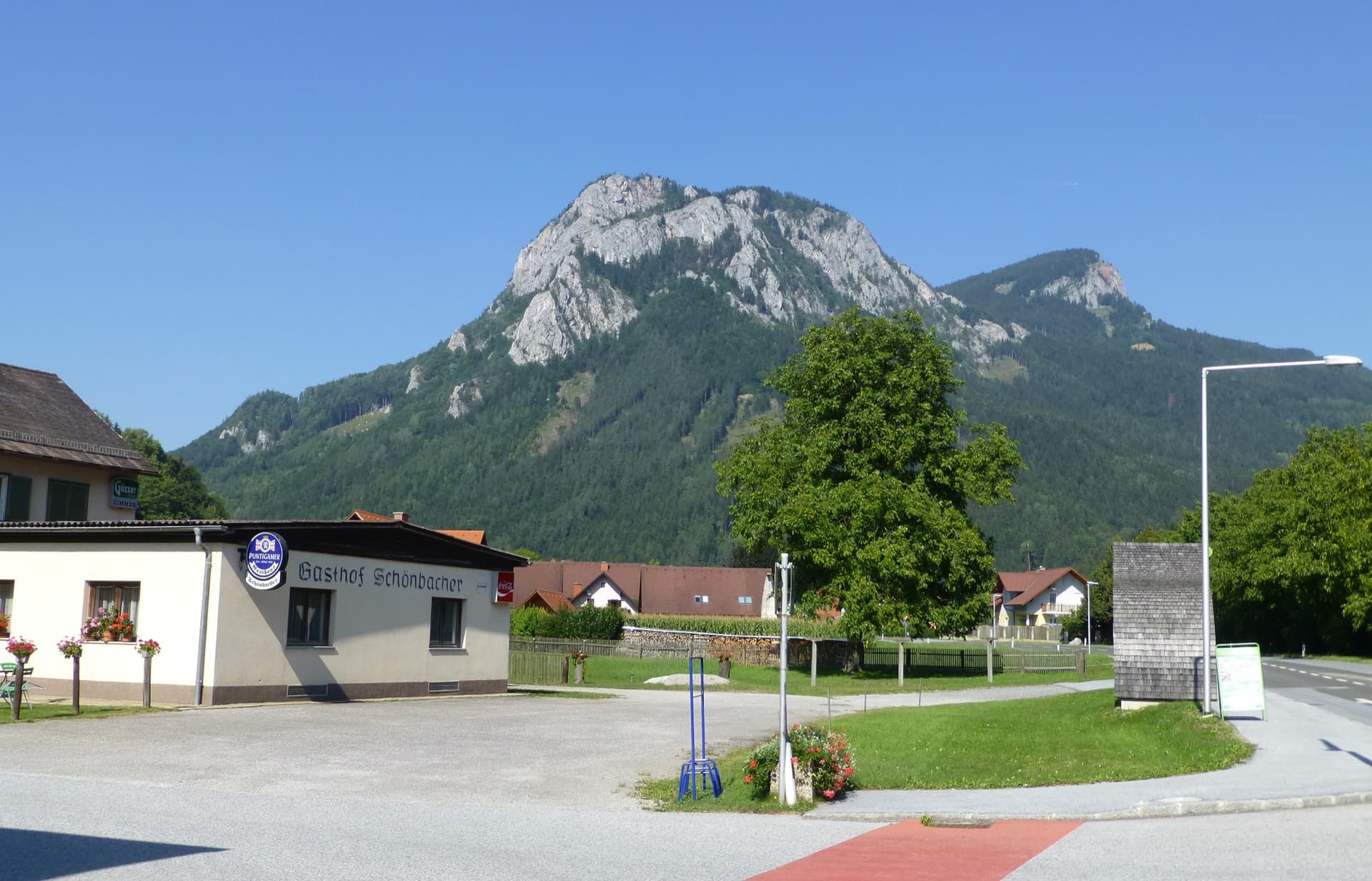 The Röthelstein from the Mur valley south of Mixnitz, showing its west and south-west side; Roter Drache climbs the south-west face to the summit