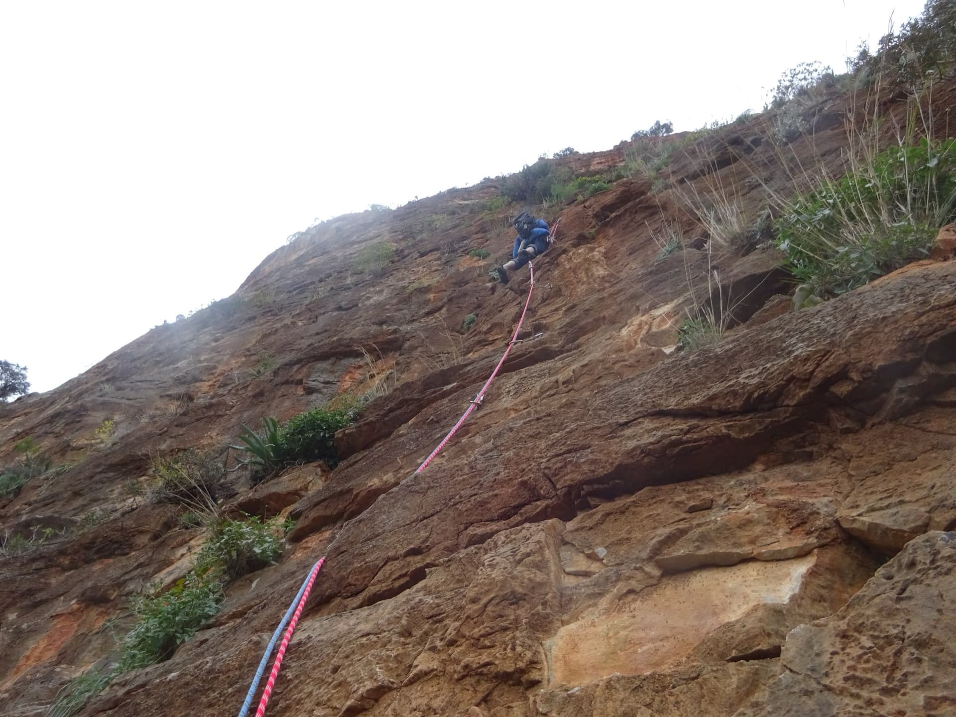 A climber on the second pitch of We Salute You, Hospital sector, Leonidio