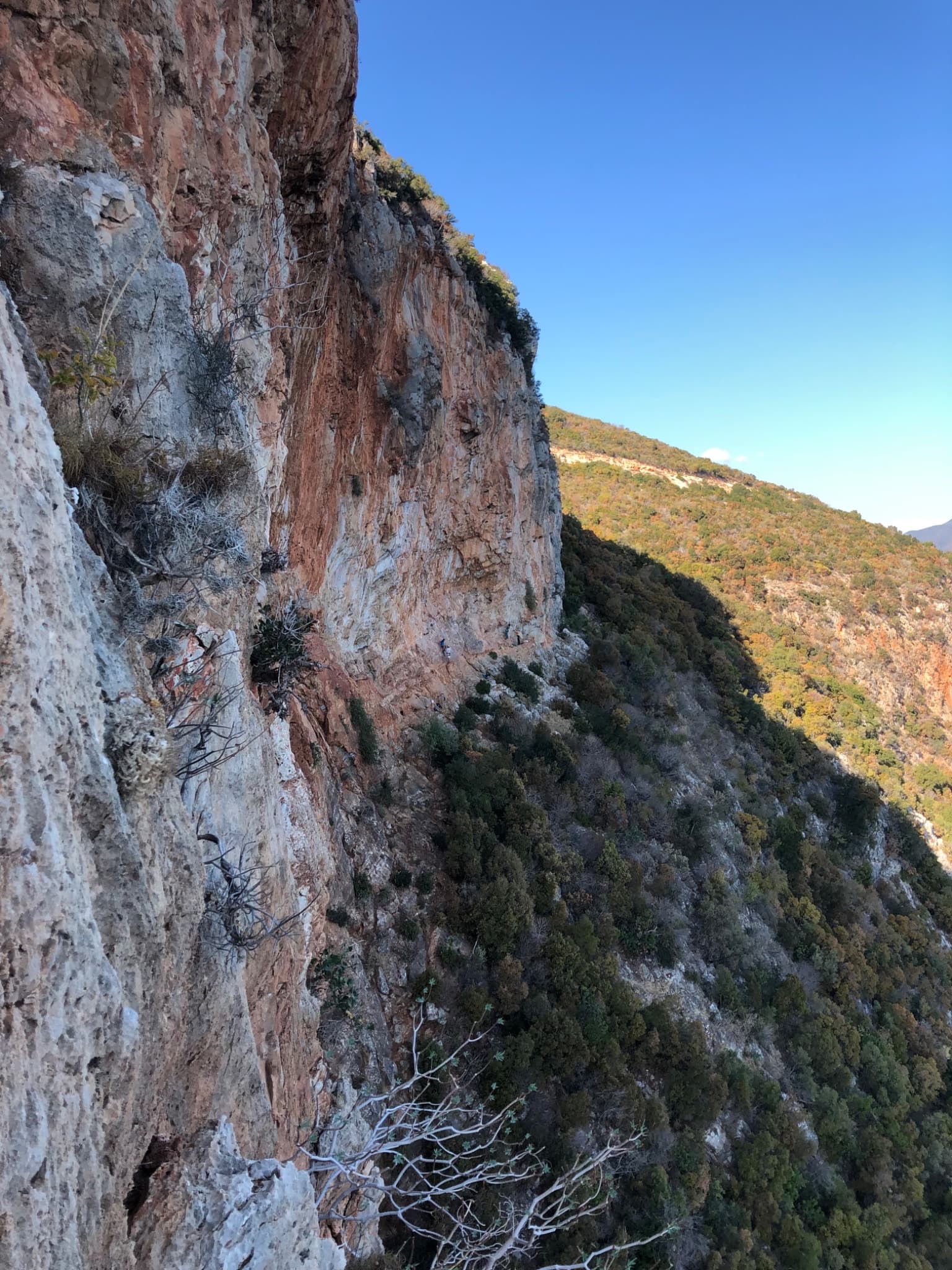 The red wall of Kapsala above the sea, north of Kyparissi