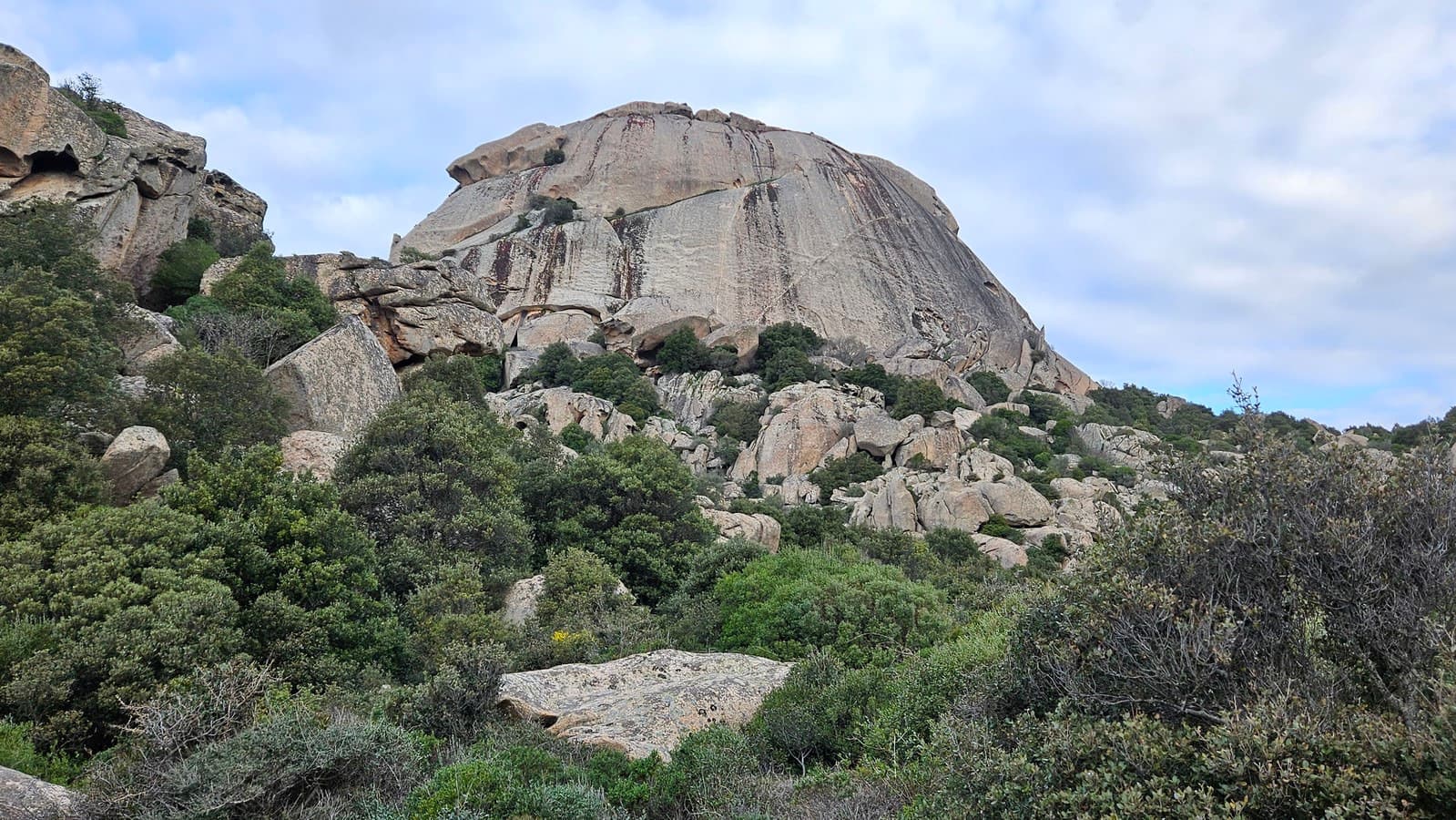 The granite dome of Monte Pulchiana from the approach path