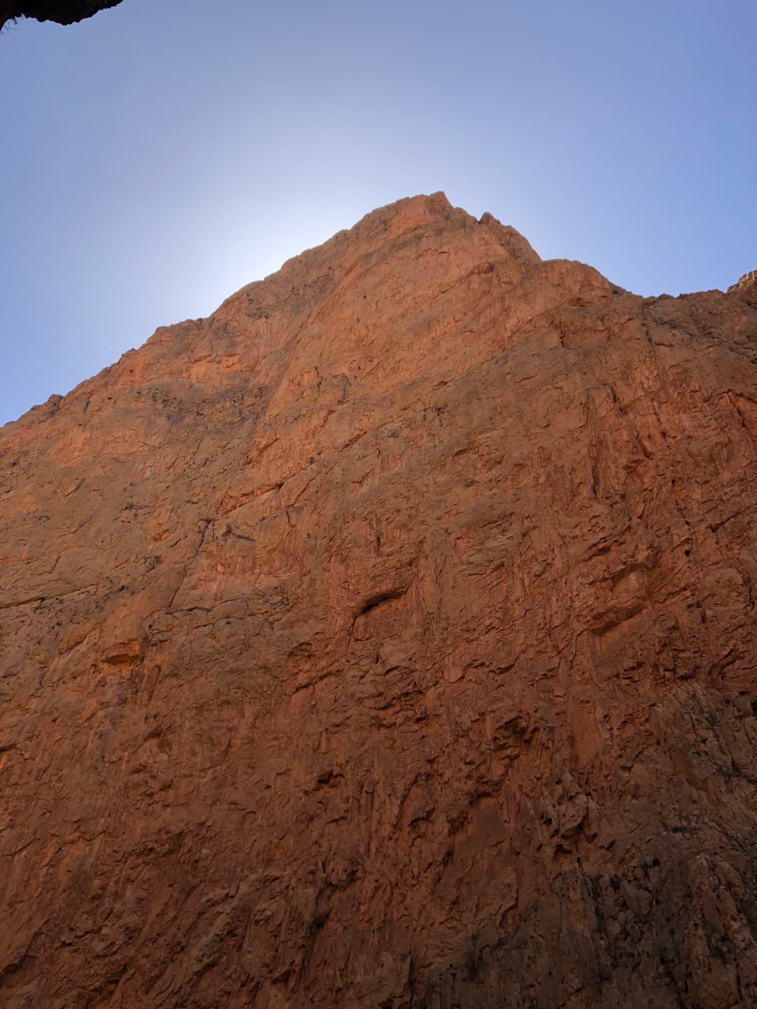 Looking up the north face of the Taoujdad from the canyon
