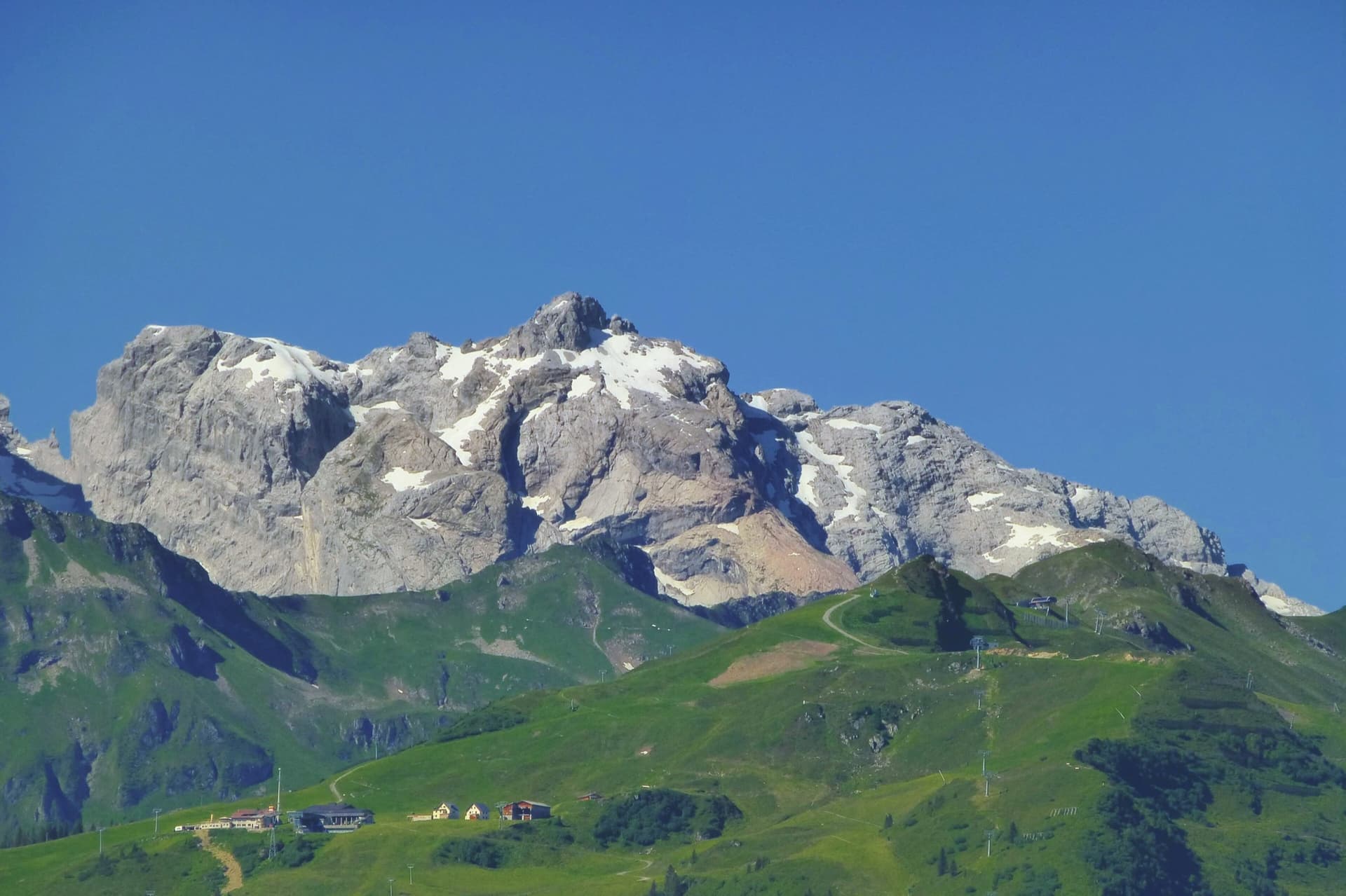 The Drusenfluh massif from the north, seen from Rellseck above Bartholomäberg. The Gelbeck is a buttress low on this side of the mountain above the Gauertal; the wall and the line are not identified in this view.