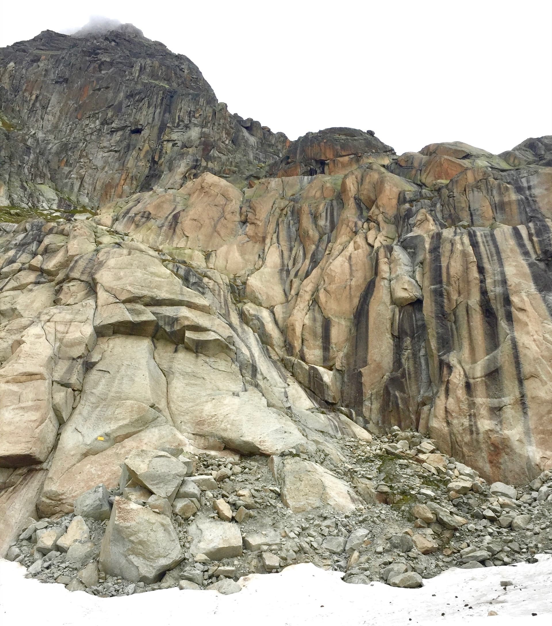 The Kristall sector at the foot of the Gross Furkahorn, with the snow patch below the slabs