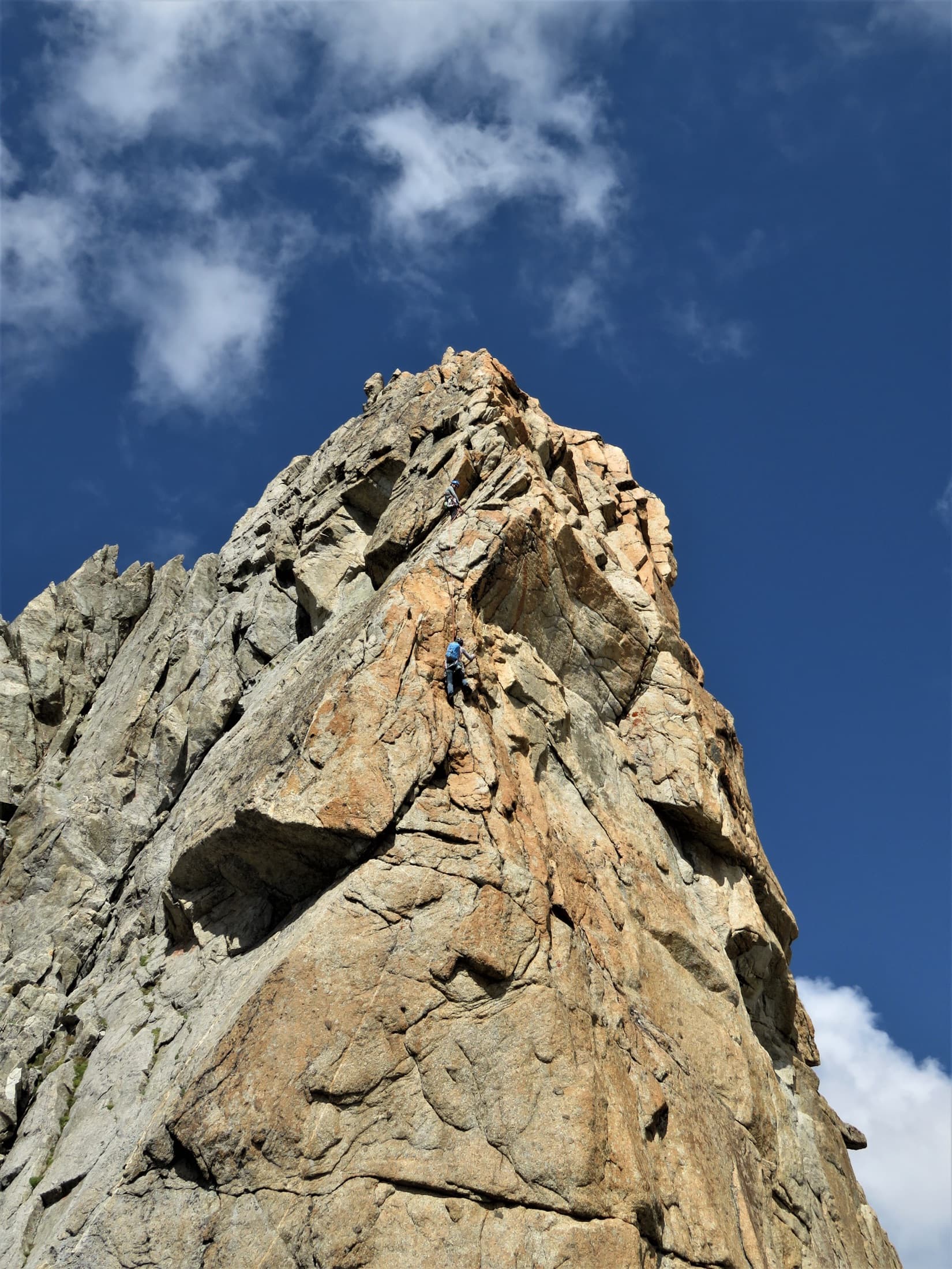 A climber on the last two pitches of Gérémiade, below the summit of the Aiguille d'Orny