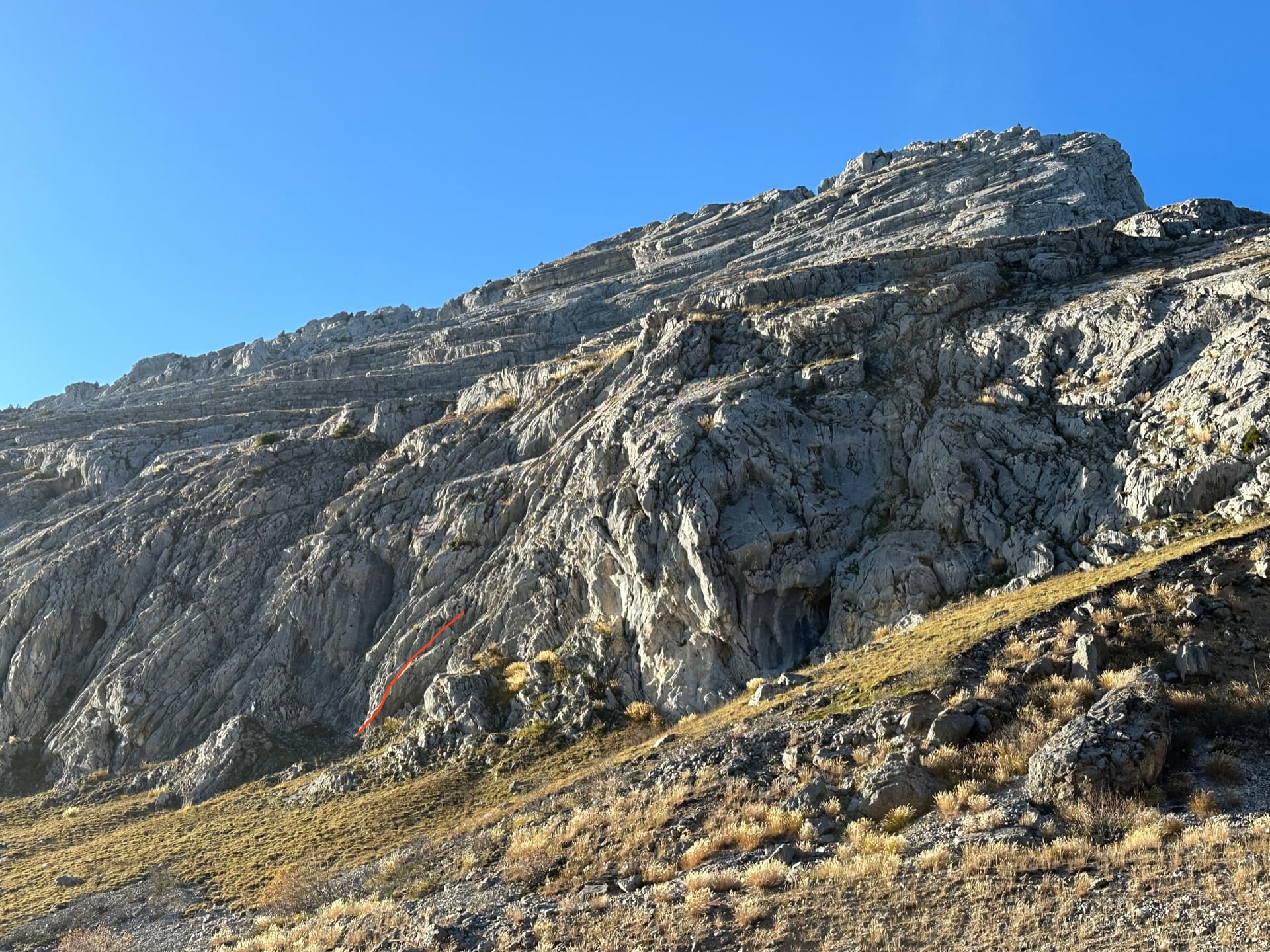 The lower slabs of the Pic de Jallouvre above the quarry car park, with the start of Les Miss marked in red