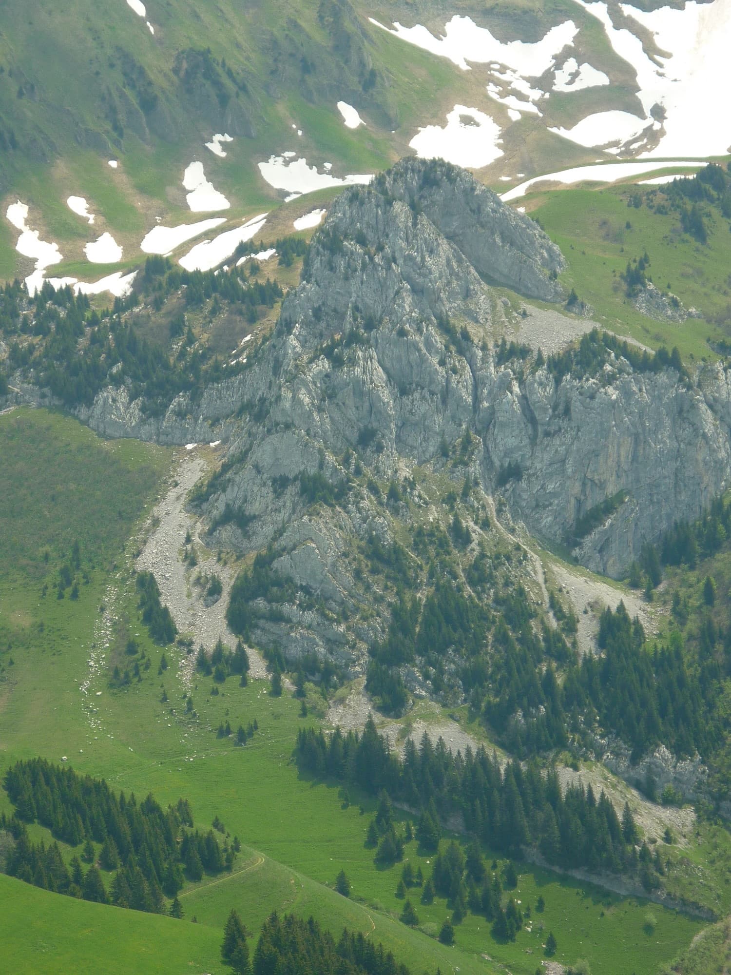 The Pointe de Sosay above the Cenise pastures; the Voie Rodrigue climbs the tiered face to the summit