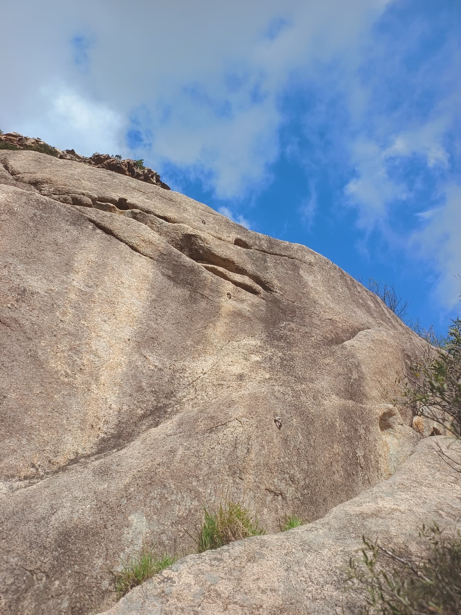 The lower friction slabs of the Punta d'Arghjavara, photographed on an ascent of Altore in April 2026