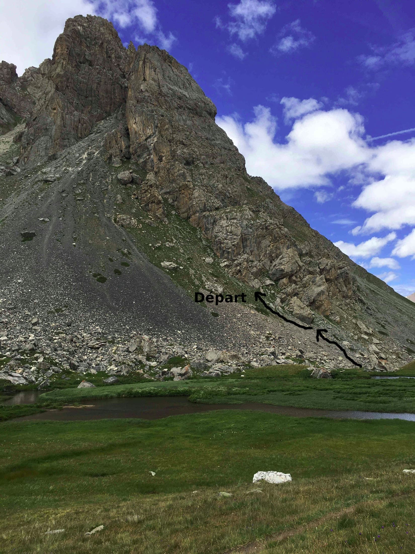 The Pavé du Chardonnet from the marshy flats above the hut, with the way to the start marked