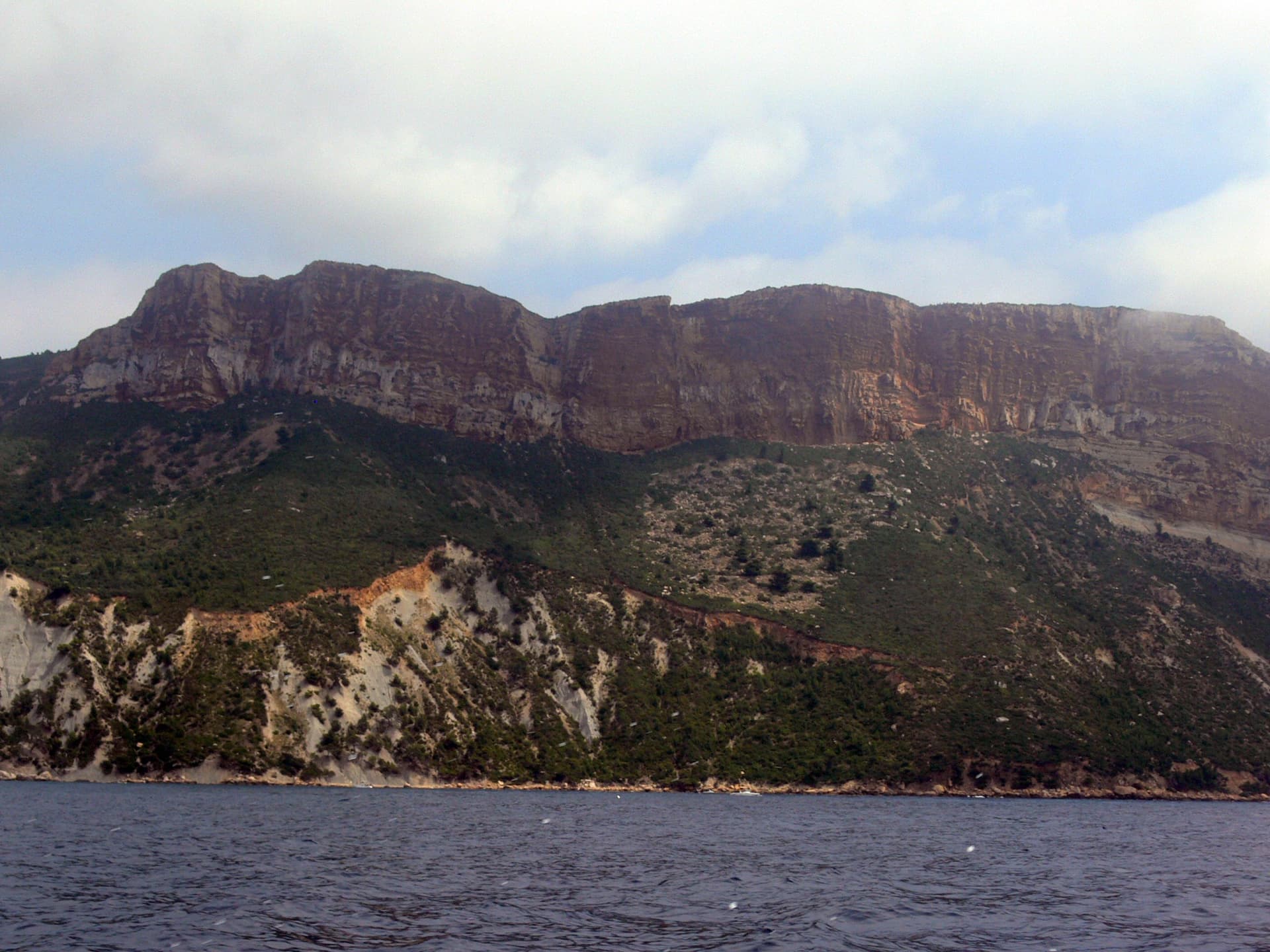 The cliffs of Cap Canaille seen from the sea, Cassis end; the Sémaphore sector is further south-east on the same line of cliffs