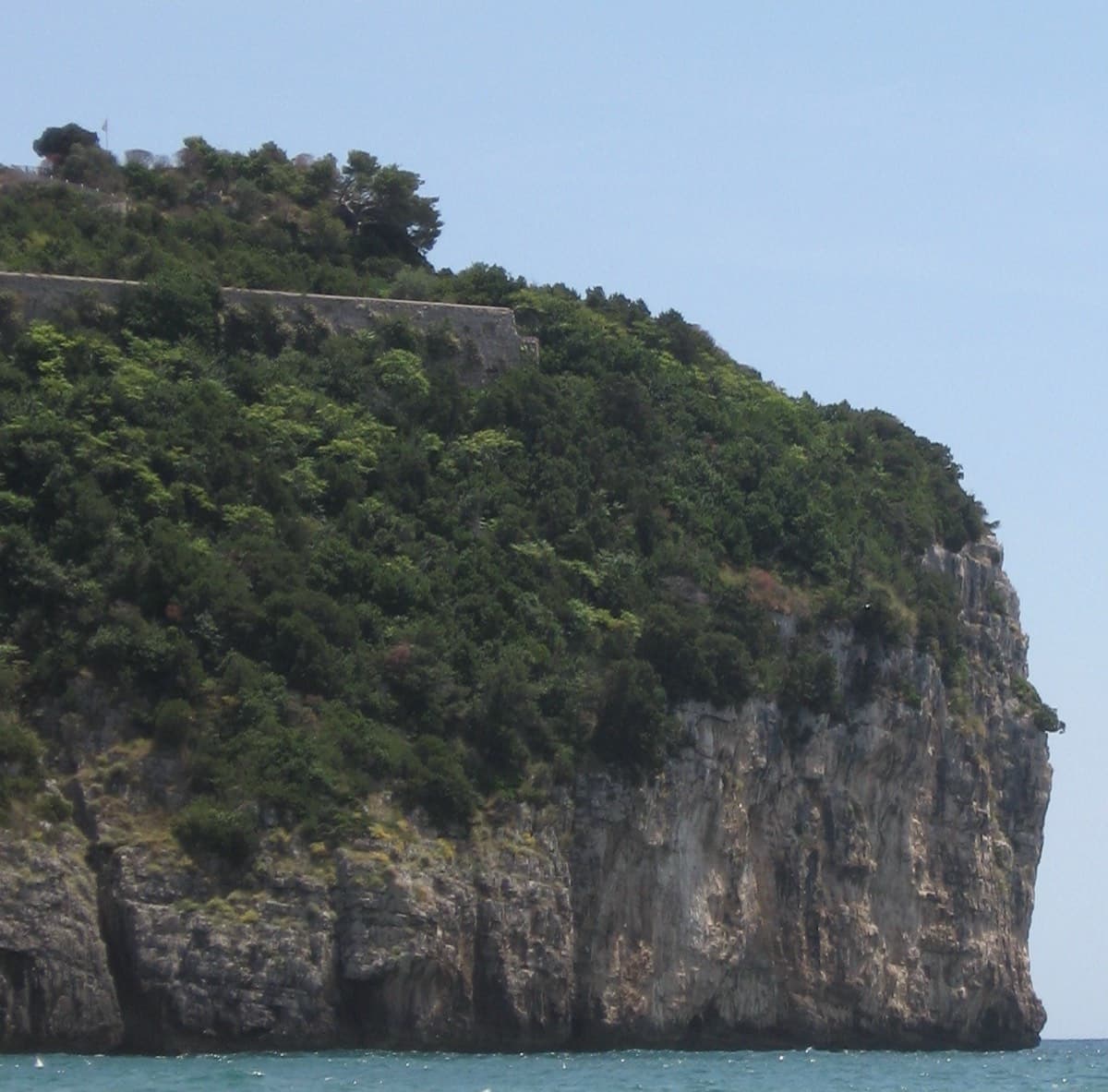 The sea cliff of Montagna Spaccata seen from the beach at Gaeta