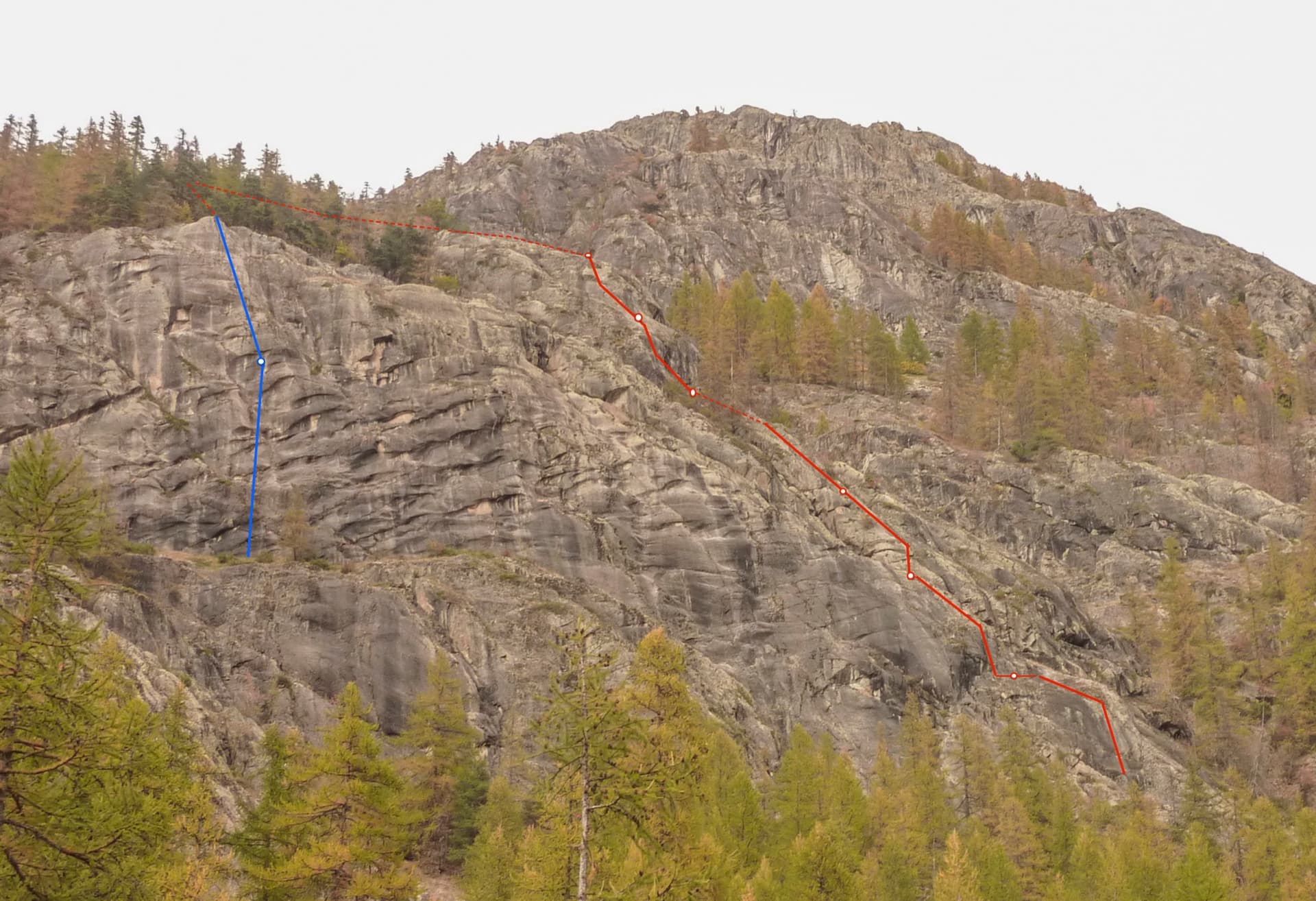 The buttresses below the Tête de la Draye above Ailefroide, with Spit On Cup in red and its two abseils in blue
