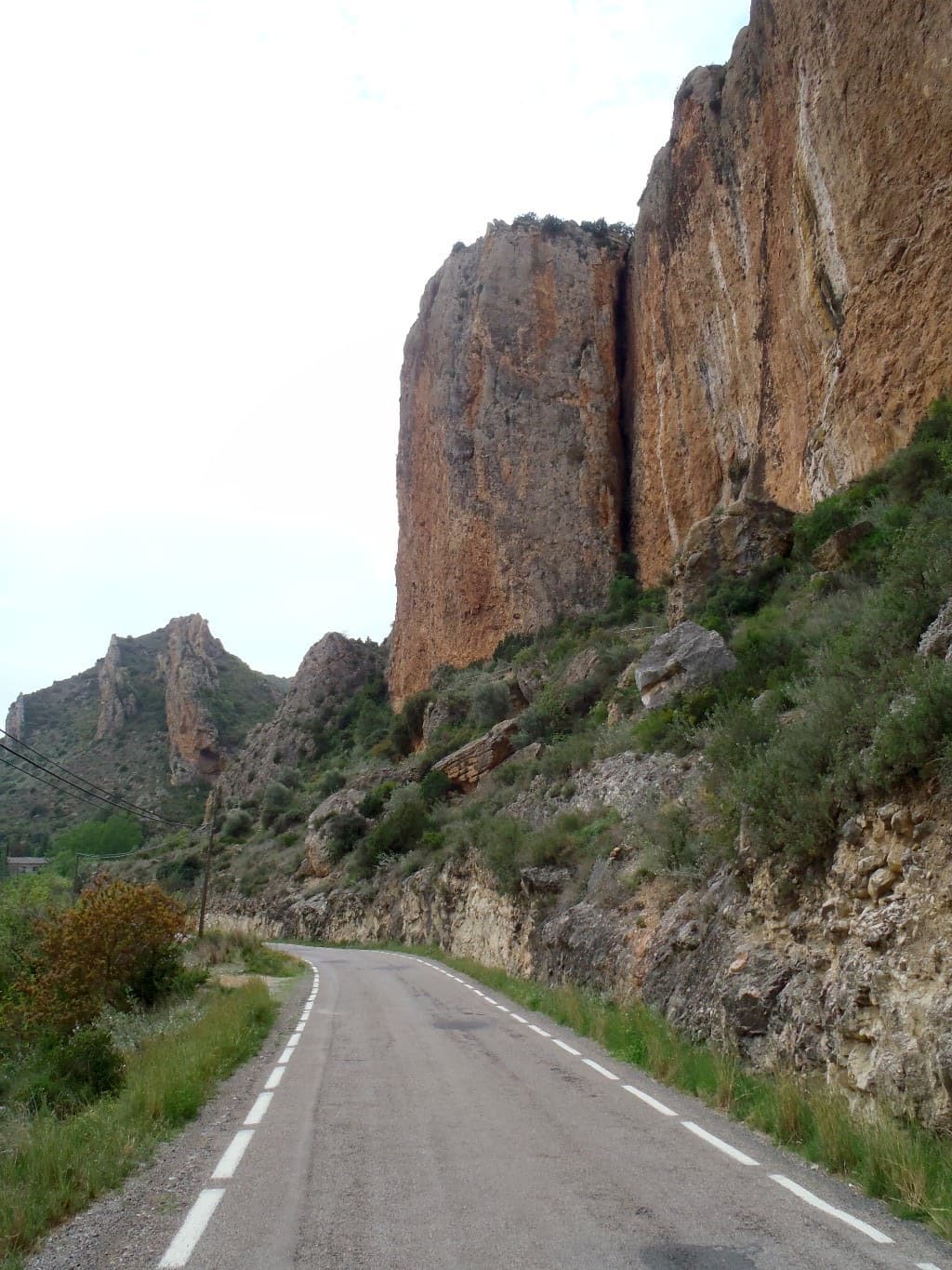 El Cilindre at Sant Llorenç de Montgai seen from the road; La Directa climbs the conglomerate tower