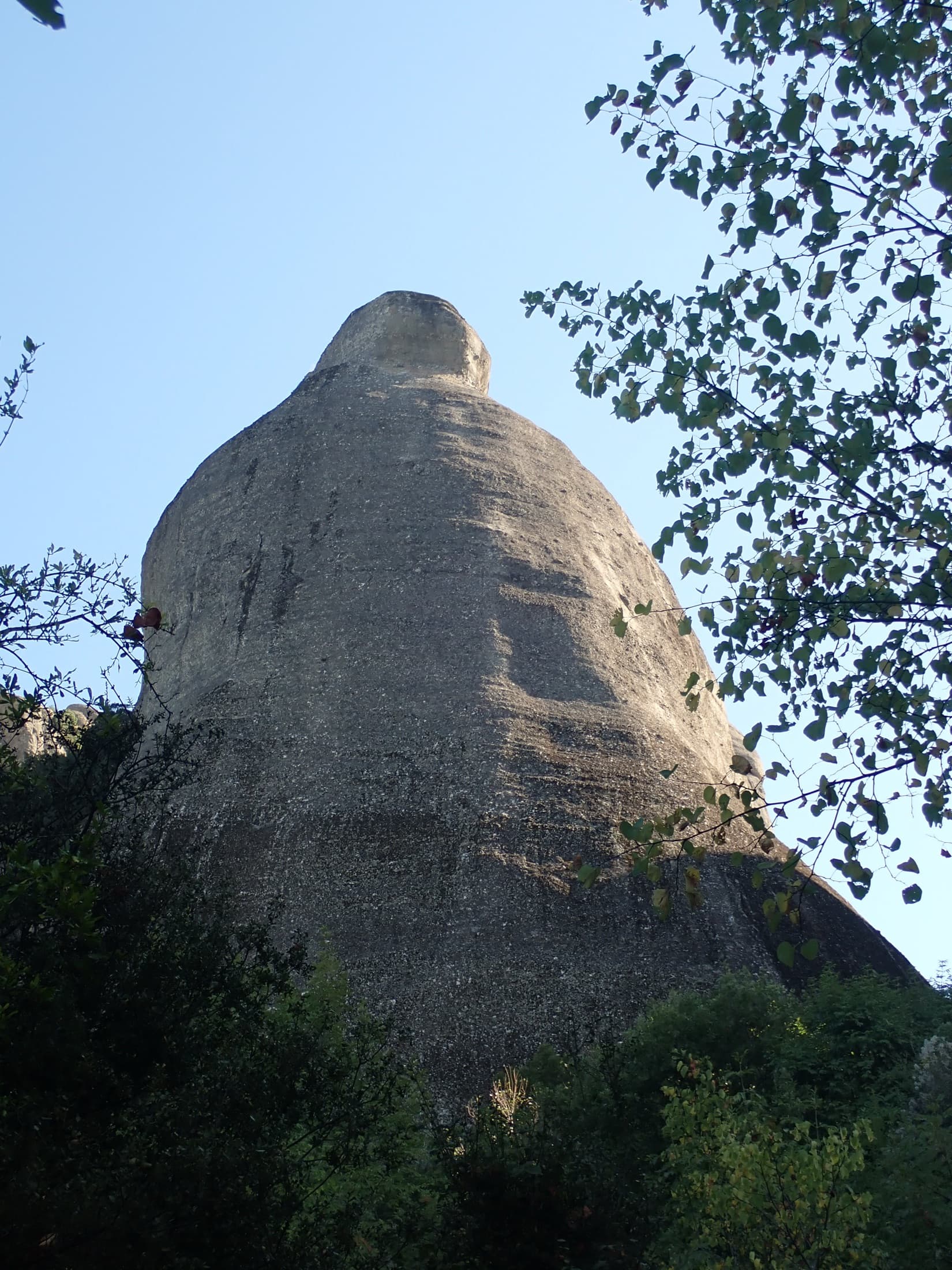 Glocke (The Bell) at Meteora from the foot of the wall; Interamerica climbs the middle of the face